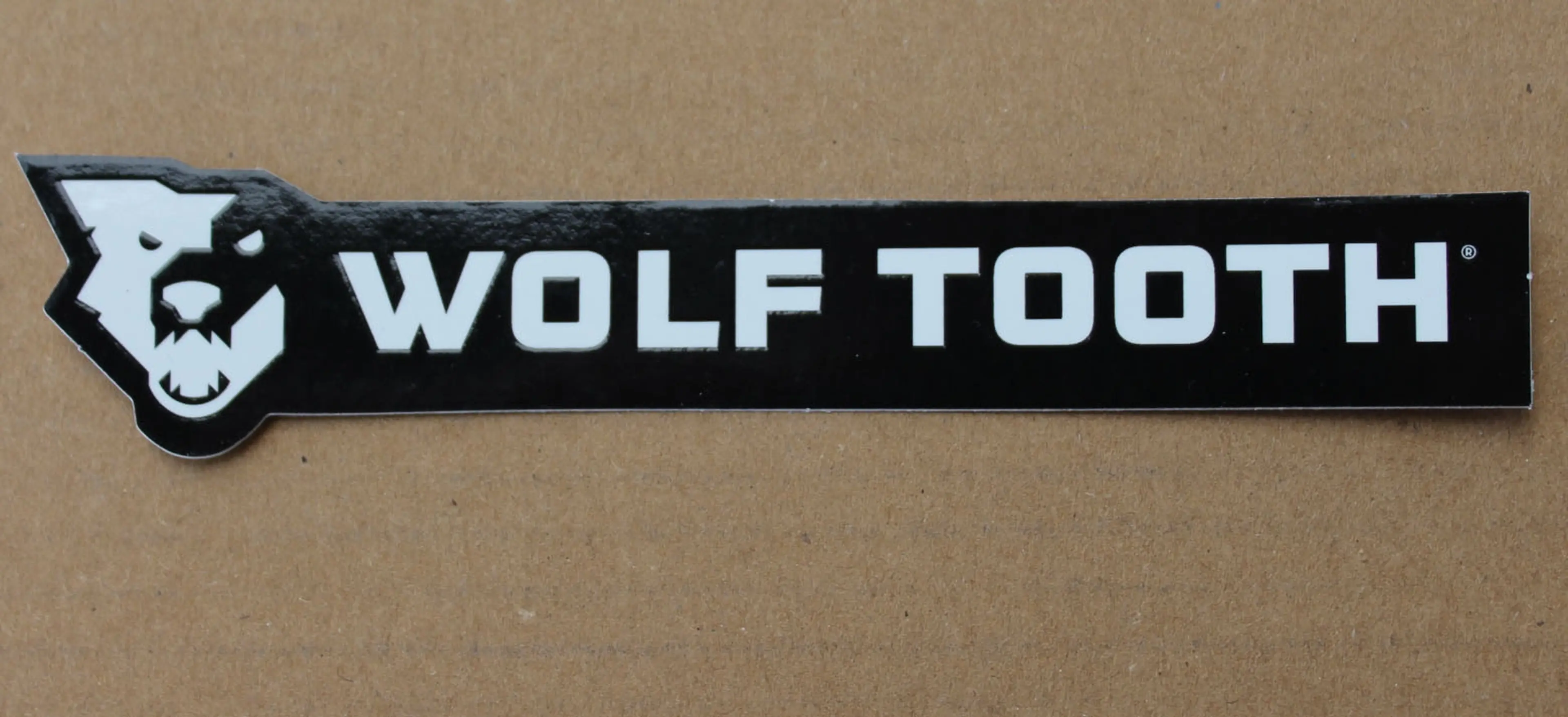 1. Wolf Tooth 130/25mm sticker - invert