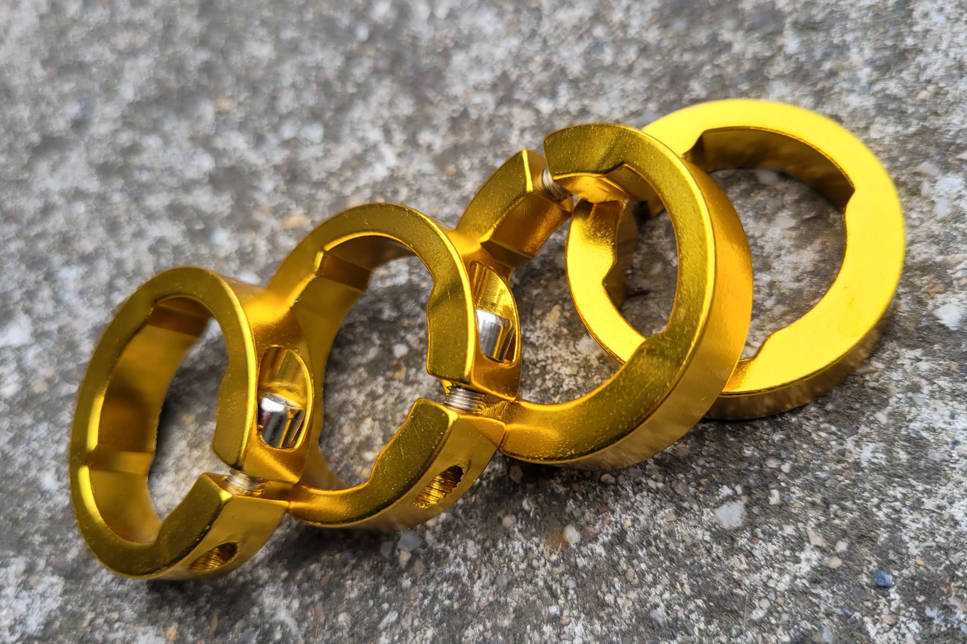 Image On-Off inele Lock-On pentru manson bicicleta - auriu eloxat